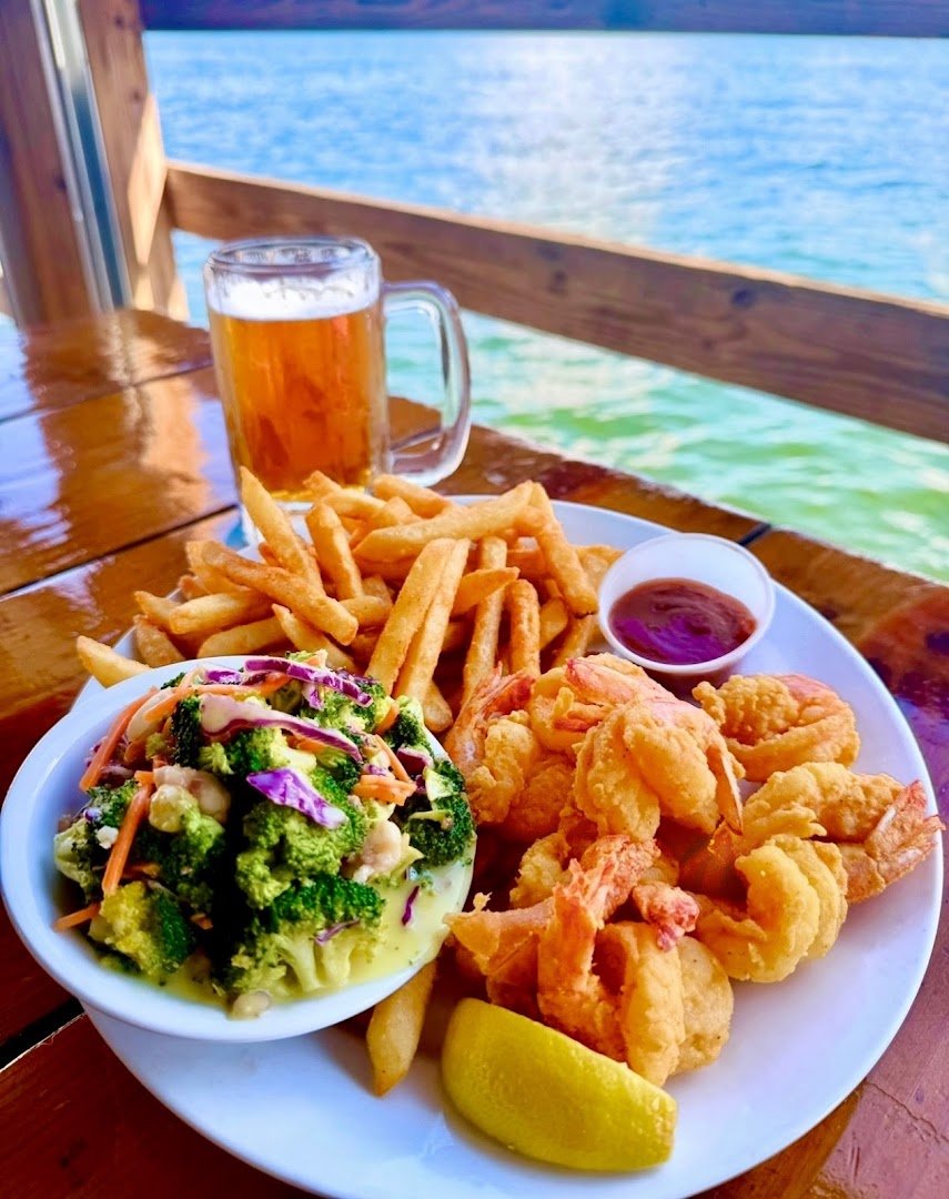 Grilled fish on a casual seafood plate.